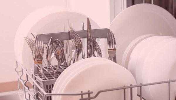 dirty silverware in the dishwasher