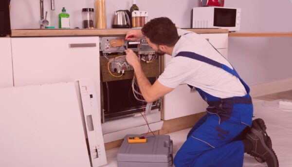 professional repairing whirlpool dishwasher